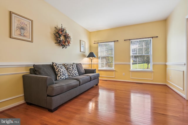 living room with wood-type flooring