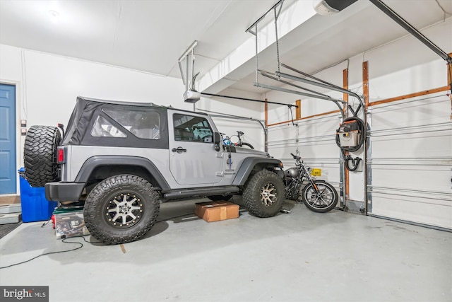 garage featuring a garage door opener