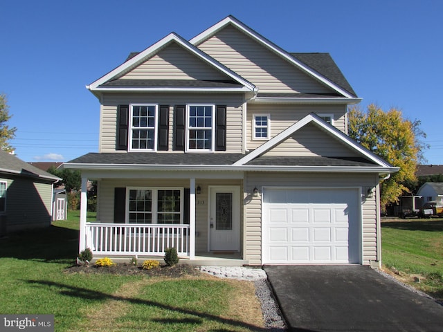 view of front of property featuring a front lawn and a porch