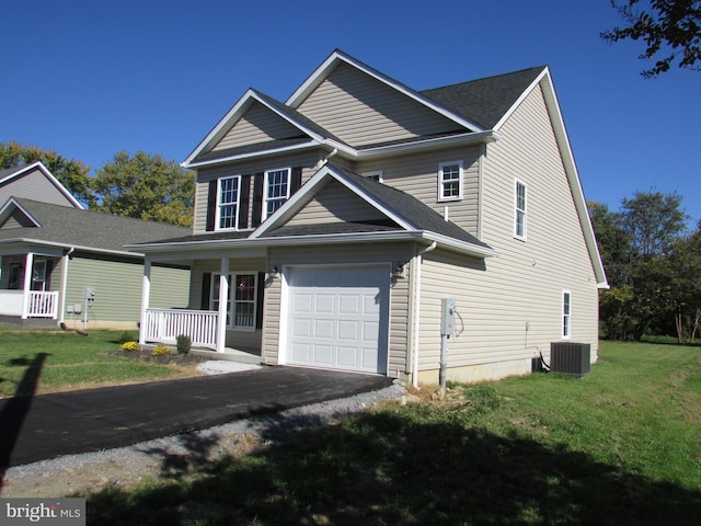 view of front facade with central air condition unit, a front lawn, and covered porch