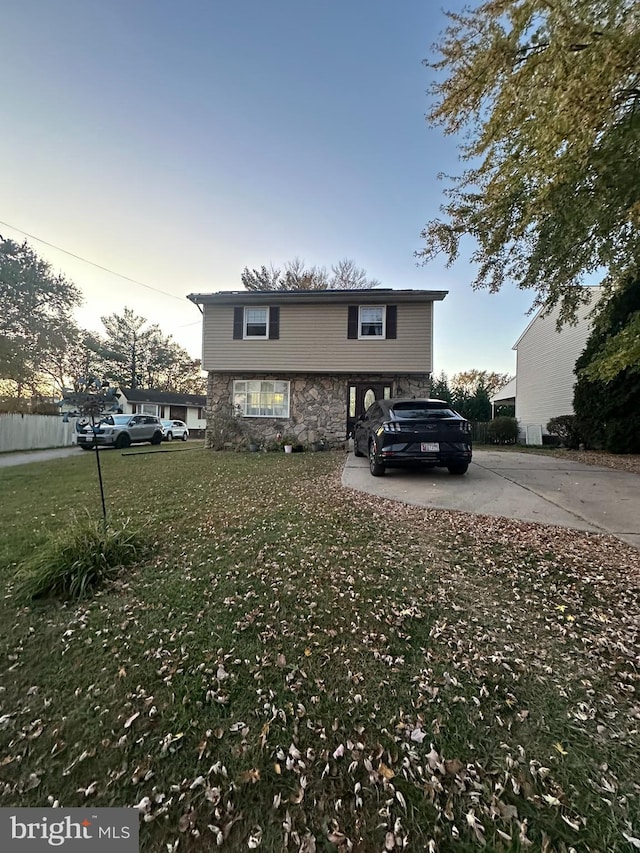 view of front of home with a front lawn