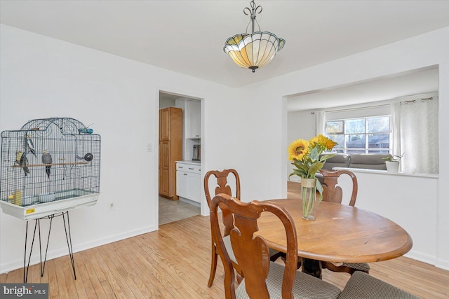 dining space featuring light hardwood / wood-style floors