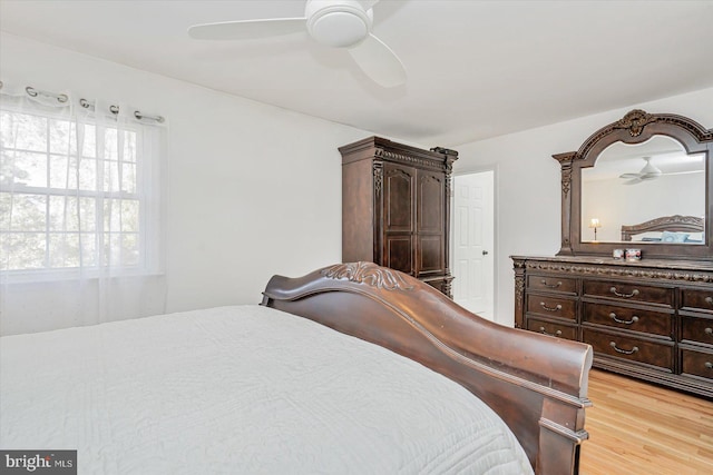 bedroom featuring ceiling fan and light hardwood / wood-style floors