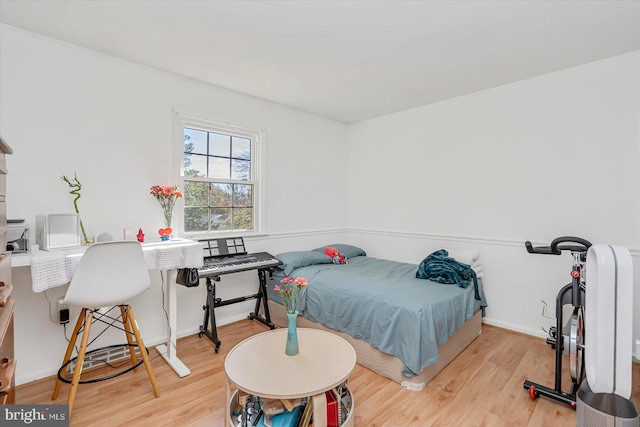 bedroom with light hardwood / wood-style flooring