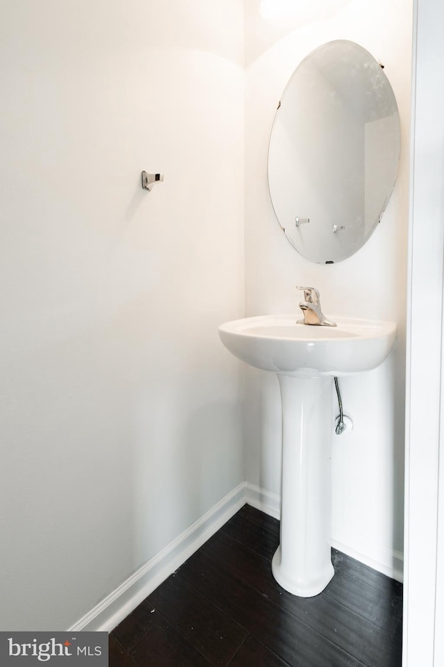 bathroom featuring wood-type flooring