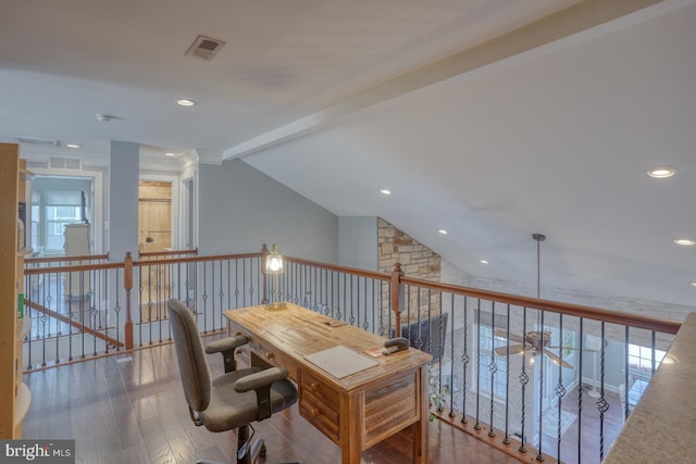 home office with vaulted ceiling with beams, hardwood / wood-style floors, and ceiling fan