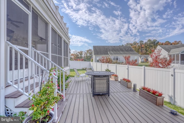 deck featuring a sunroom