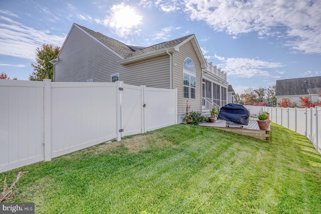 view of home's exterior with a lawn