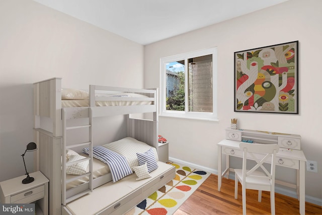 bedroom with light hardwood / wood-style floors