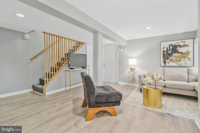 living room with light hardwood / wood-style floors