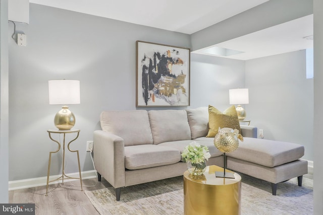 living room with light hardwood / wood-style flooring