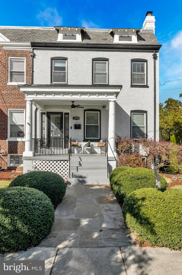 view of property with covered porch