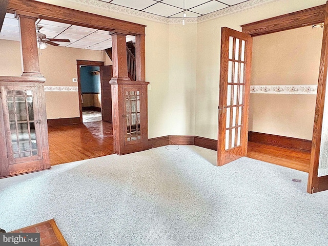 unfurnished room with hardwood / wood-style flooring and ceiling fan