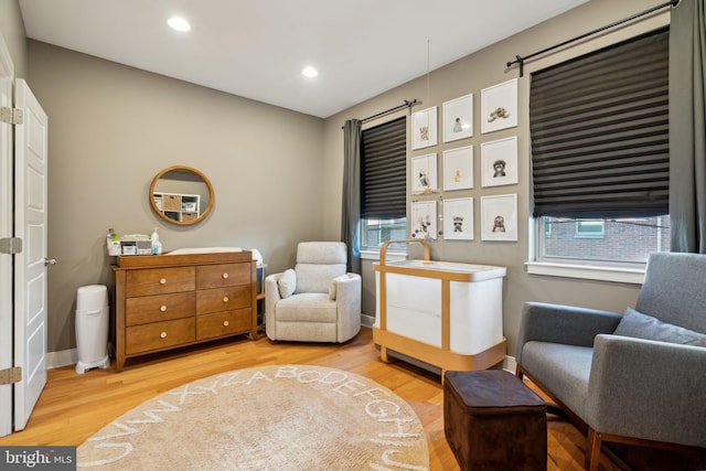 sitting room featuring light hardwood / wood-style flooring and a healthy amount of sunlight