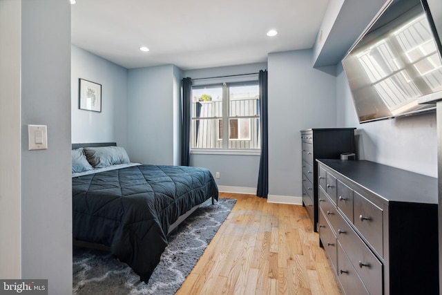 bedroom featuring light wood-type flooring