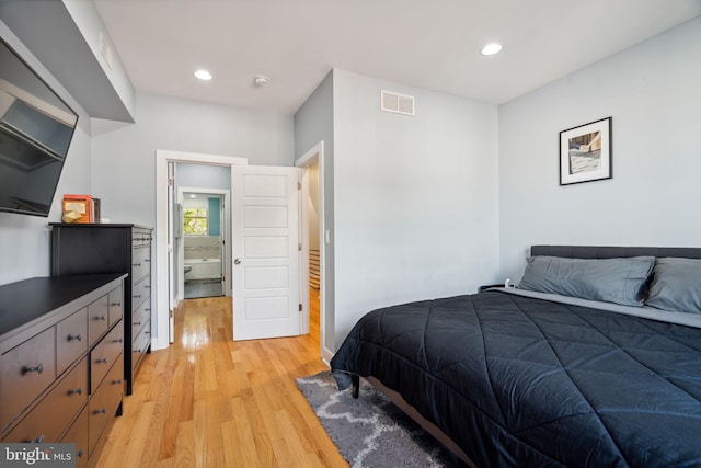 bedroom featuring light wood-type flooring