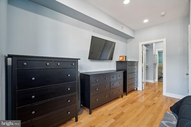 bedroom with light hardwood / wood-style flooring