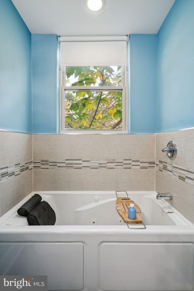 bathroom featuring a tub