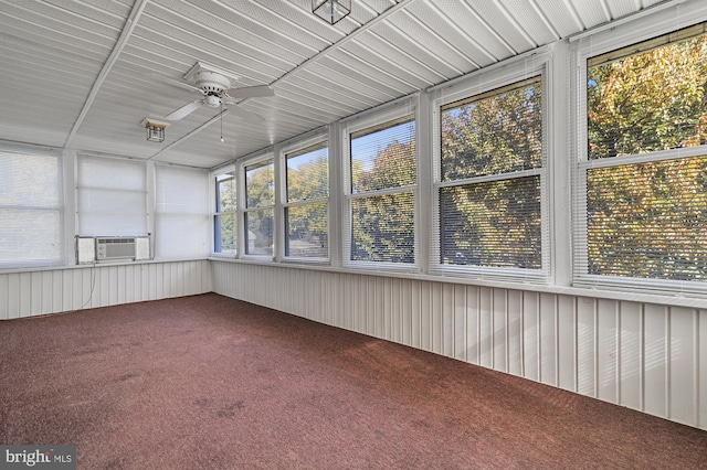 unfurnished sunroom with ceiling fan and cooling unit