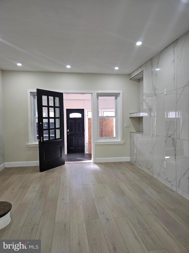 entryway with light wood-type flooring