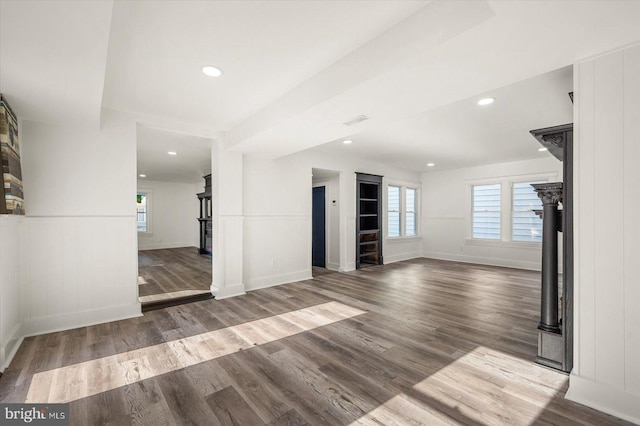 unfurnished living room with hardwood / wood-style floors