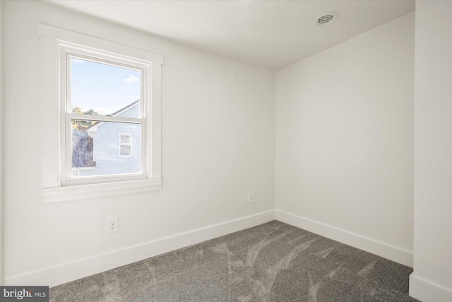 empty room featuring carpet floors