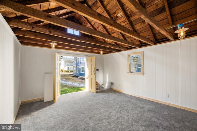 interior space featuring wood walls and wood ceiling