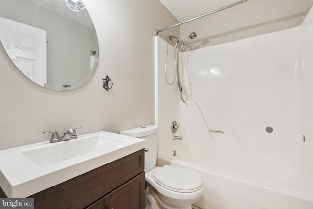 full bathroom with shower / bathing tub combination, vanity, and toilet