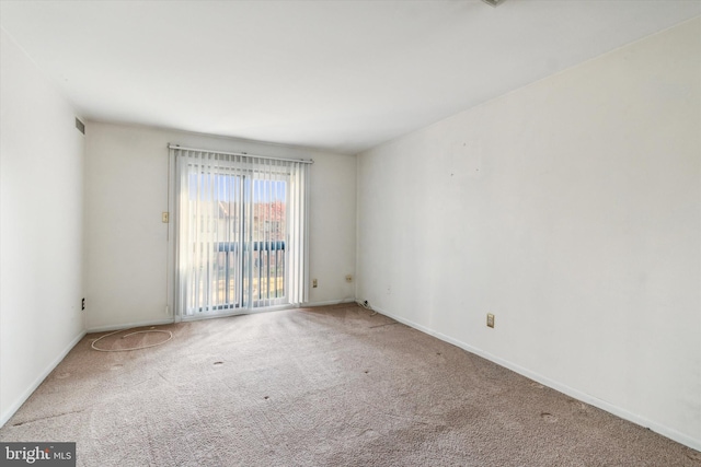 view of carpeted spare room