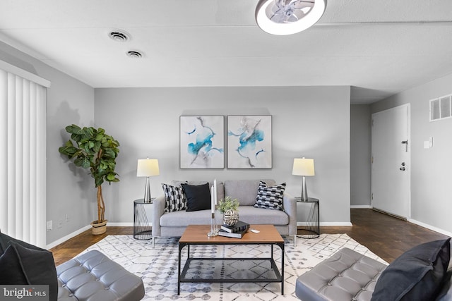 living room with dark wood-type flooring