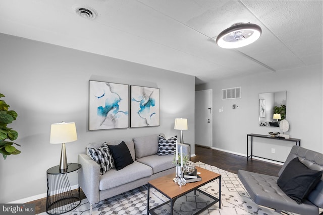 living room with hardwood / wood-style floors