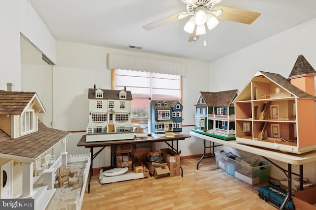 office area with ceiling fan and light wood-type flooring