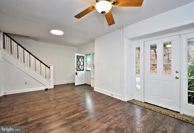 foyer with ceiling fan, dark hardwood / wood-style flooring, and a wealth of natural light