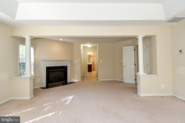 unfurnished living room featuring light colored carpet