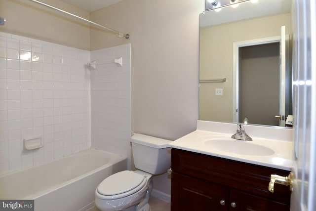 full bathroom featuring vanity, toilet, and tiled shower / bath combo