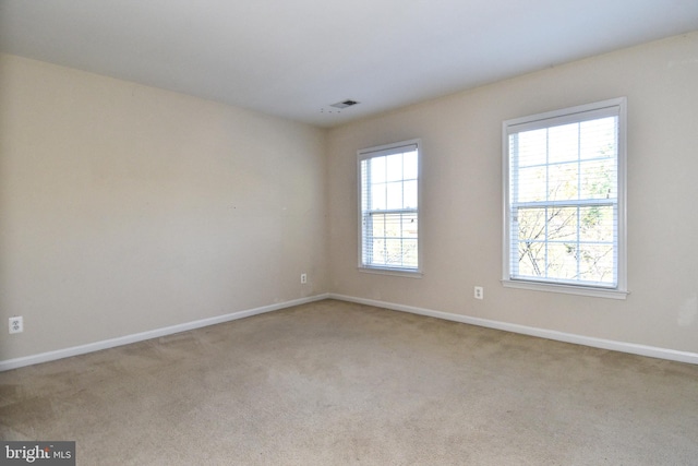 view of carpeted spare room