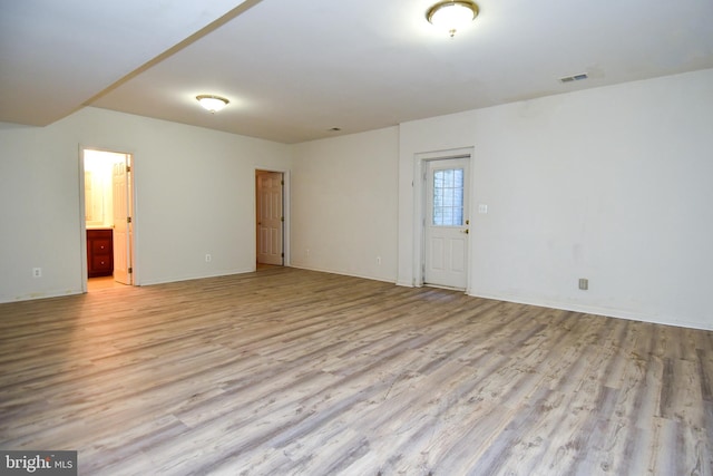 empty room featuring light hardwood / wood-style floors