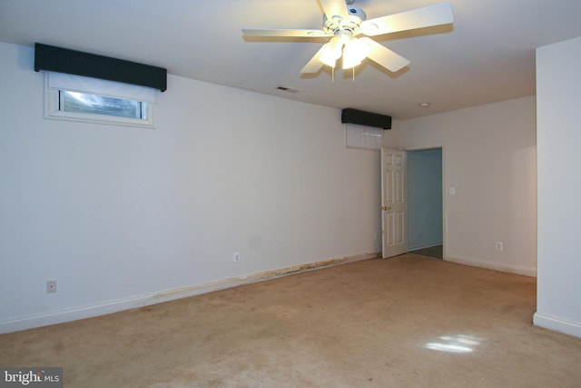 spare room with ceiling fan