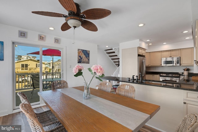 694 21st St, Avalon, NJ 08202 - dining space featuring dark wood-style floors, recessed lighting, and stairs
