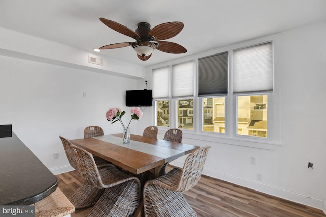 694 21st St, Avalon, NJ 08202 - dining room with wood finished floors, visible vents, ceiling fan, and baseboards
