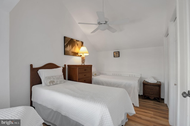 694 21st St, Avalon, NJ 08202 - bedroom with wood finished floors, ceiling fan, and vaulted ceiling