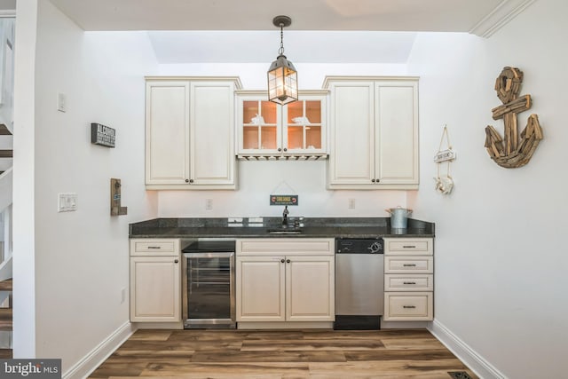 694 21st St, Avalon, NJ 08202 - kitchen with cream cabinetry, wine cooler, and dishwasher