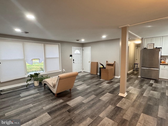 living room featuring dark hardwood / wood-style floors