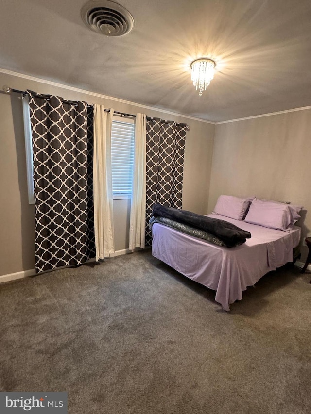 unfurnished bedroom featuring carpet floors and crown molding