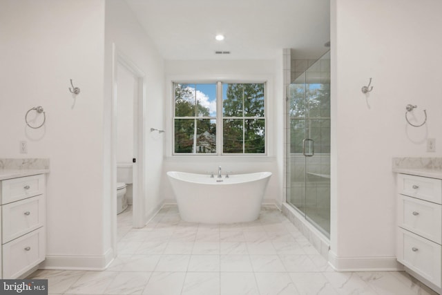 full bathroom with vanity, independent shower and bath, and toilet