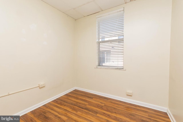 unfurnished room featuring wood-type flooring