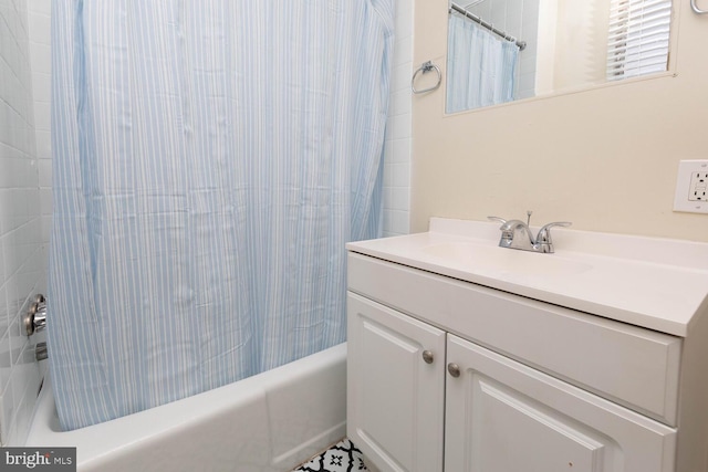 bathroom featuring vanity and shower / tub combo