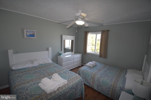 bedroom with a baseboard radiator, a textured ceiling, ceiling fan, dark wood-type flooring, and ornamental molding