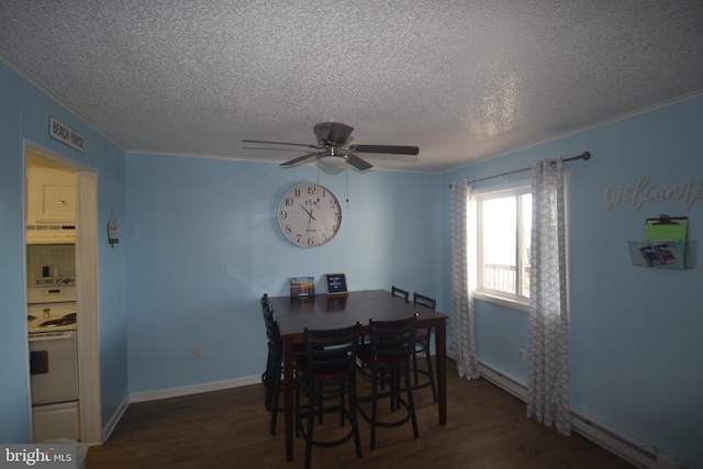 dining area with a baseboard heating unit, a textured ceiling, dark wood-type flooring, and ceiling fan