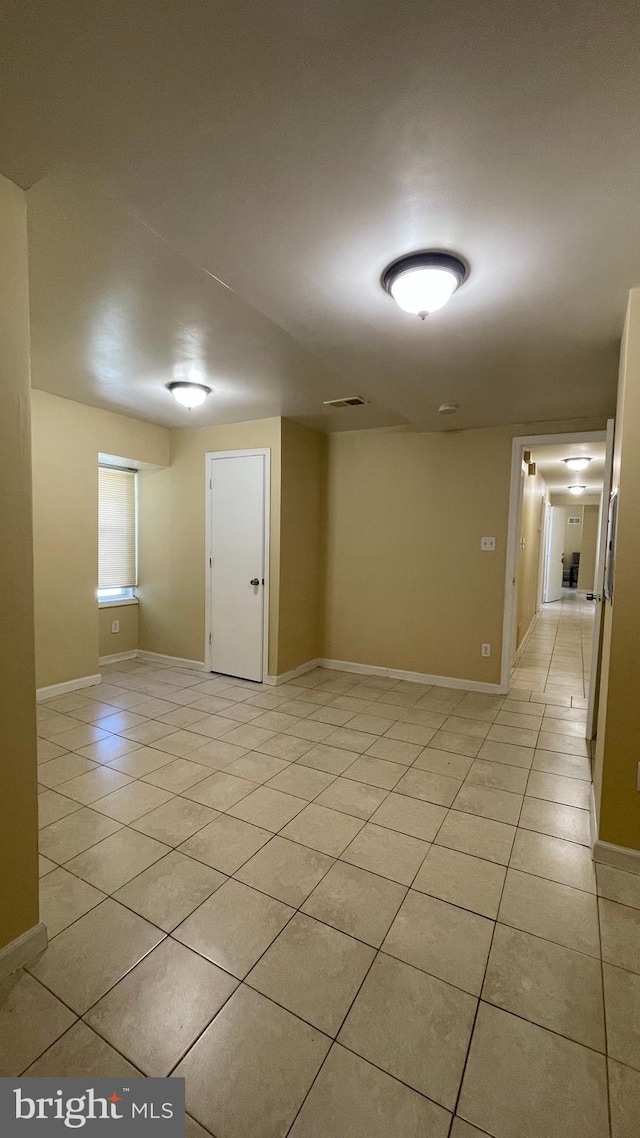 empty room featuring light tile patterned flooring